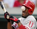 Une balle de baseball en pleine poire